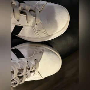 Adidas with black strips